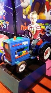 driving a toy tractor