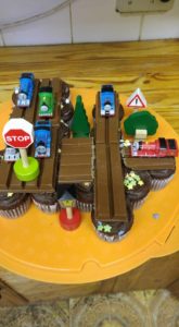 train cake with cupcakes